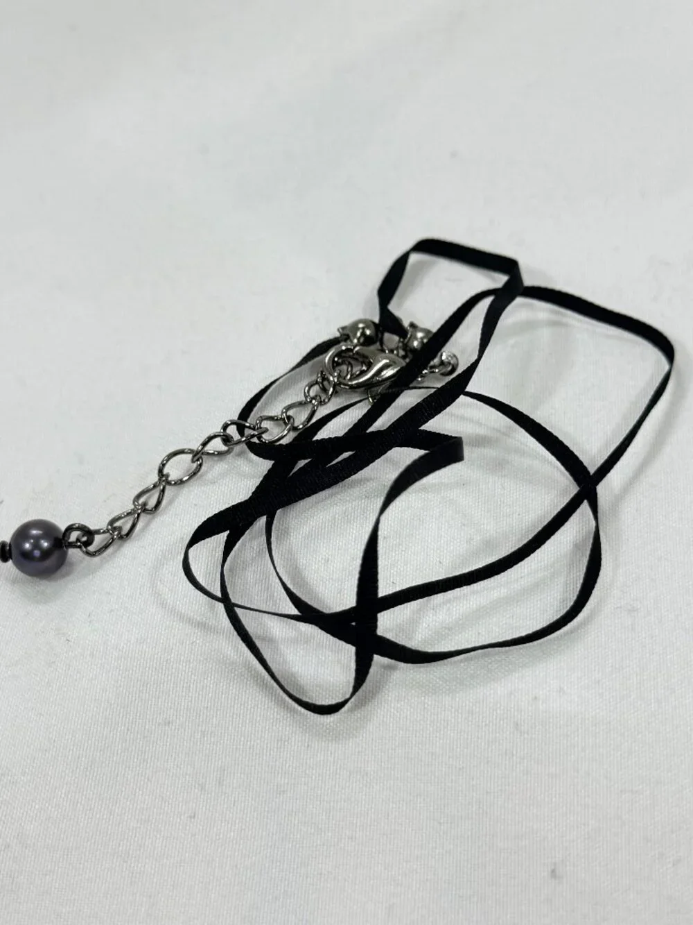 Gunmetal with black silk ribbon black pearl necklace